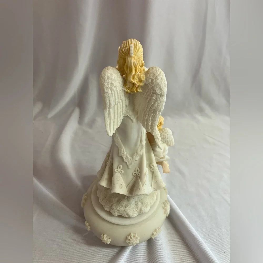 Graceful White Angel Figurine with Child